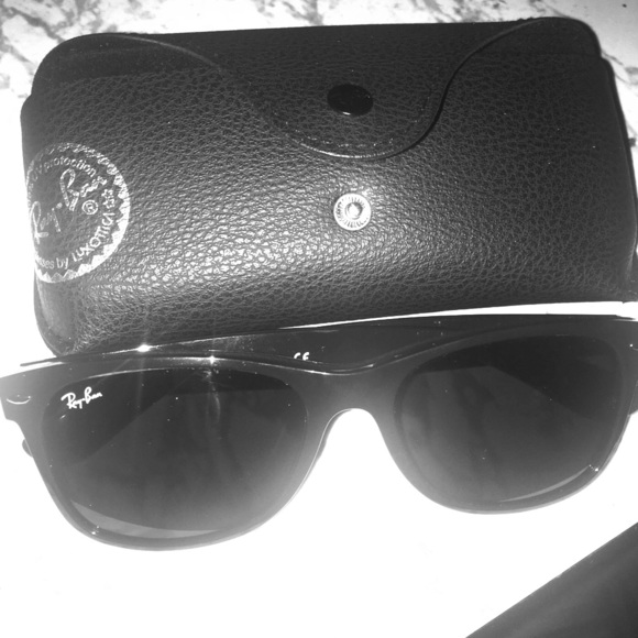 Brand New Black Ray -ban sunglasses with a case.